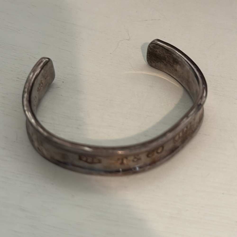 T & Co. 1837 Cuff Bracelet Sterling Silver. Bracelet is slightly bent as shown.